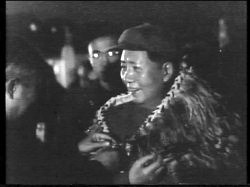 Mao Zedong wears the feather cloak from King Koroki in 1957