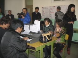Farmers learn music in a Winter class.