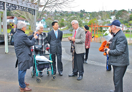 Gathered at Rewi Alley Reserve, Glenfield, Auckland: (L-R) George Andrews, Isobel Easton-Thompson, Consul-general Niu, Pat Alley, and  Duncan France.  In background are Murray Hoare, Rosemary Platt and Consul Long Yanping (with flowers to be laid in tribute to Rewi Alley).