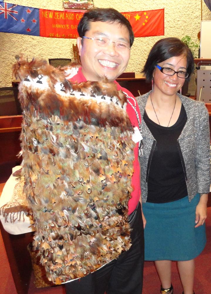 John Chen wearing Awhina’s graduation cloak woven by her grandmother. 