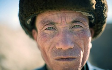 Cai Junnian's green eyes give a hint he may be a descendant of Roman mercenaries who allegedly fought the Han Chinese 2,000 years ago.  Photo: NATALIE BEHRING from Telegraph newspaper webpage - see link below.