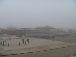 Duststorm - students' morning exercise, at Shandan Bailie School, in April
