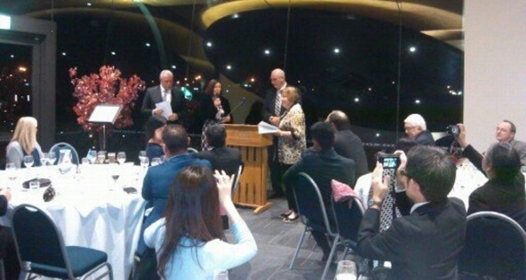 Christine Ward receiving the award at the Sister City Awards Dinner