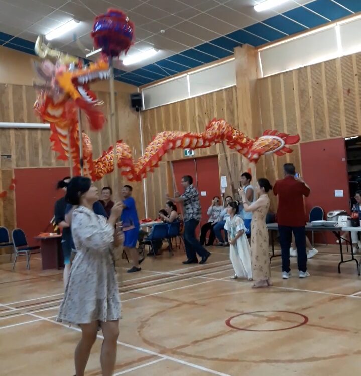 Dragon dance performance in celebration of Chinese New Year.