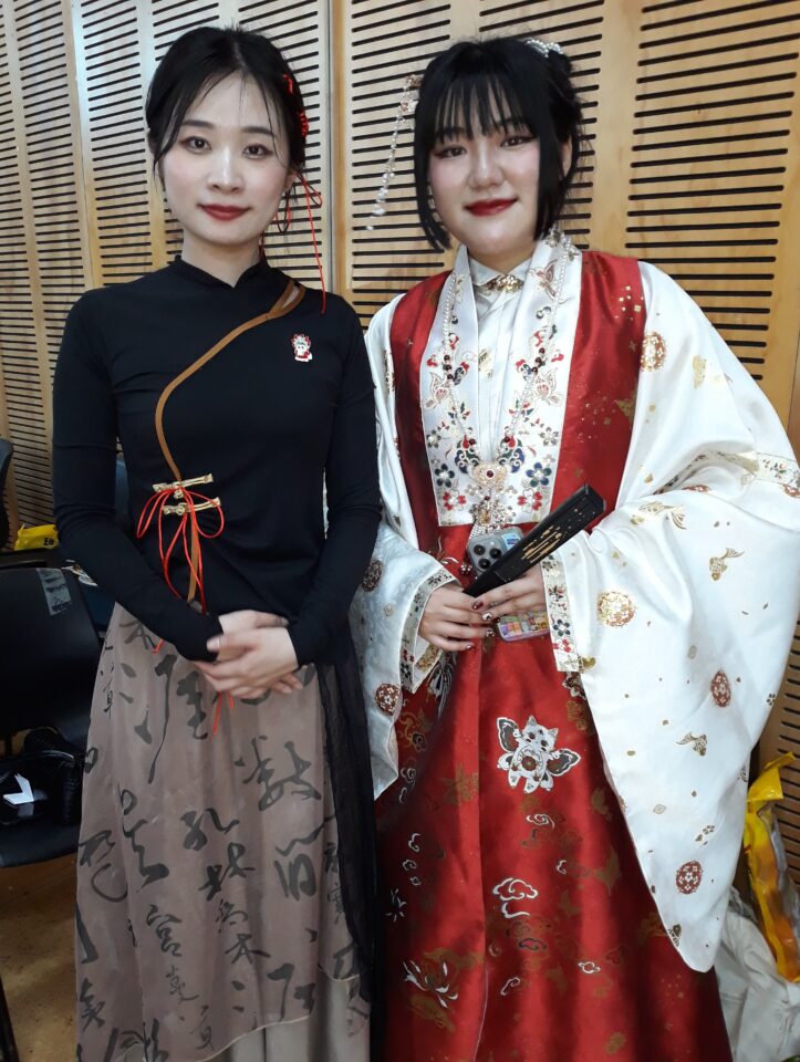 Mandarin Language Assistants Liu Jiaxuan and Liu Xuehui in traditional Chinese costume.